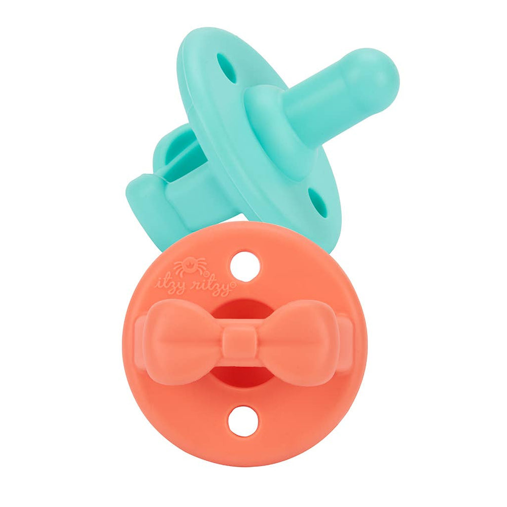 
            
                Load image into Gallery viewer, Itzy Ritzy Sweetie Soother Pacifiers // Aqua Marine &amp;amp; Peach Bows
            
        